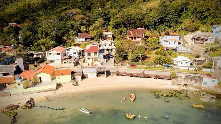 Casa com piscina, vista mar, pôr do sol.