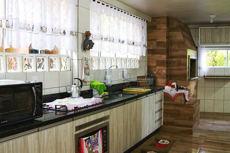 Casa com piscina, vista mar, pôr do sol.