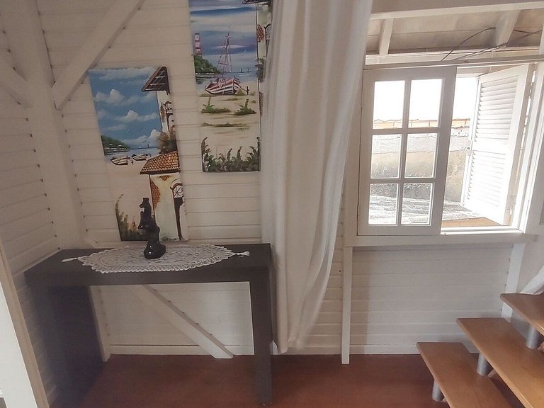 Casa com piscina, vista mar, pôr do sol.