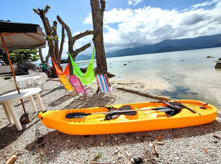 Beira mar, pôr do sol, praia particular.