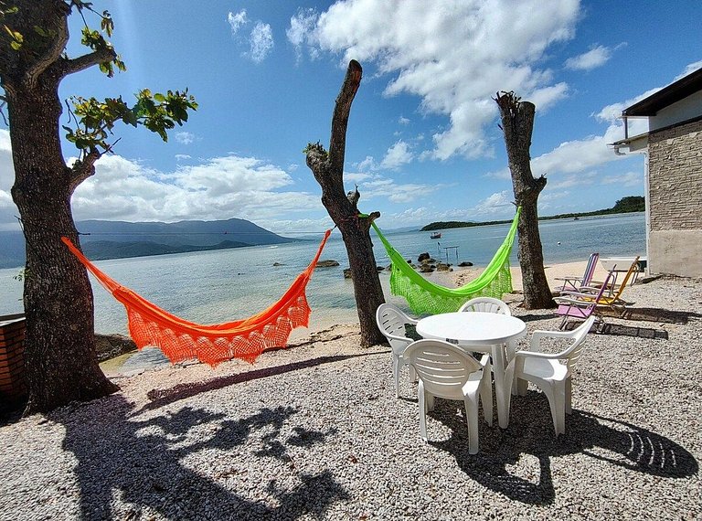 Beira mar, pôr do sol, praia particular.