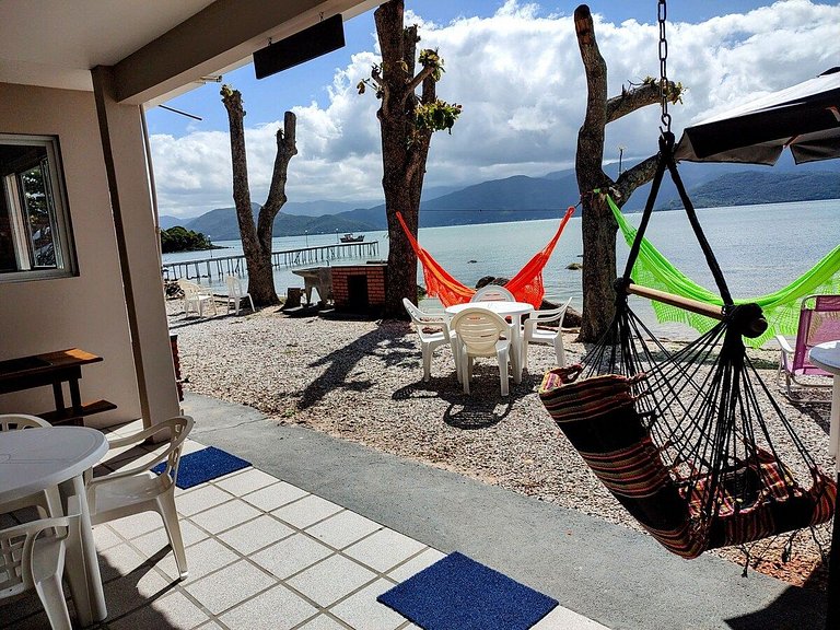 Beira mar, pôr do sol, praia particular.