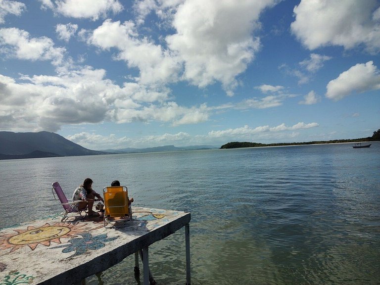 Beira mar, pôr do sol, praia particular.