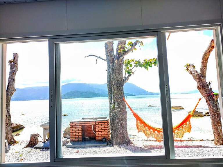 Beira mar, pôr do sol, praia particular.