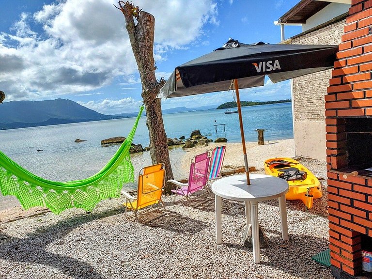 Beira mar, pôr do sol, praia particular.