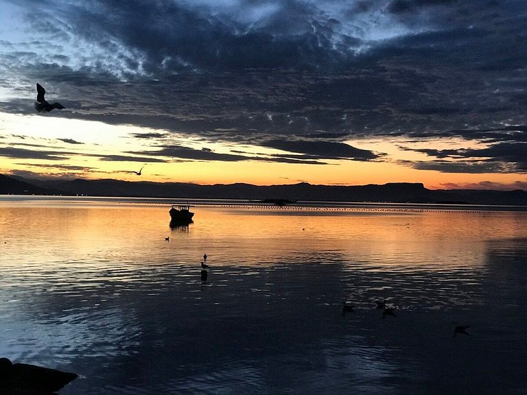 Praia, pôr do sol, sossego e exclusividade